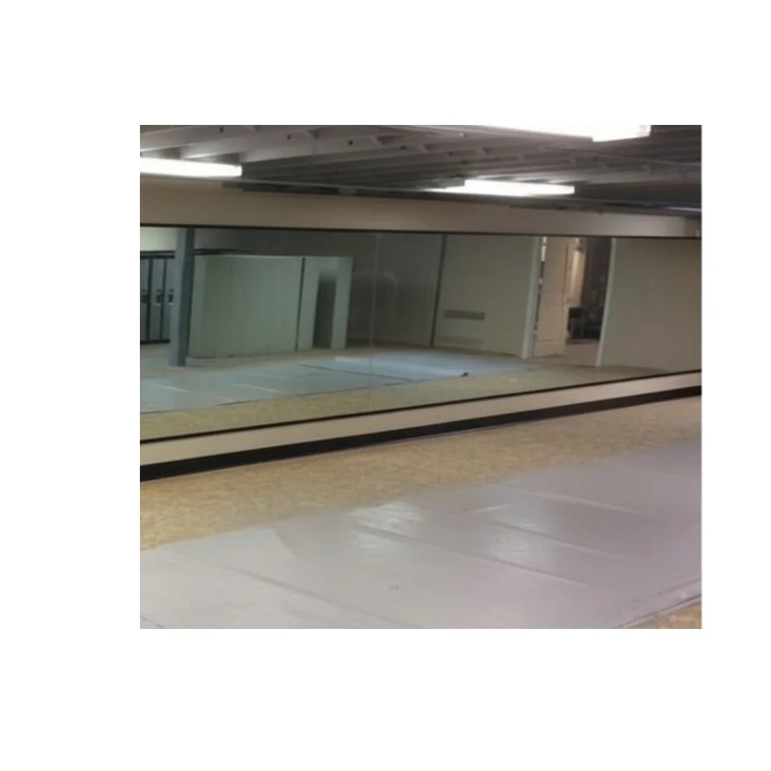 Large mirror wall in modern dance studio or fitness facility